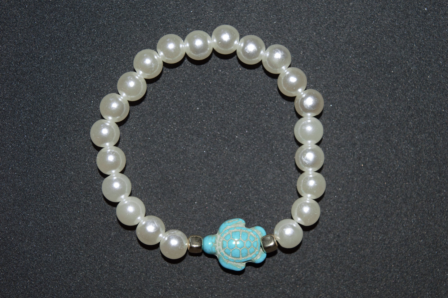 Cream pearl and blue turtle bracelet