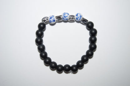 Flower ceramic and black stone bead bracelet