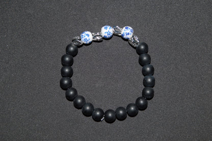 Flower ceramic and black stone bead bracelet