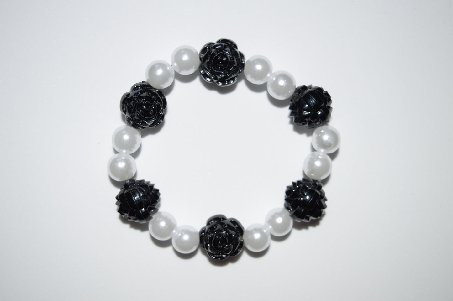 White pearl and black rose bead bracelet