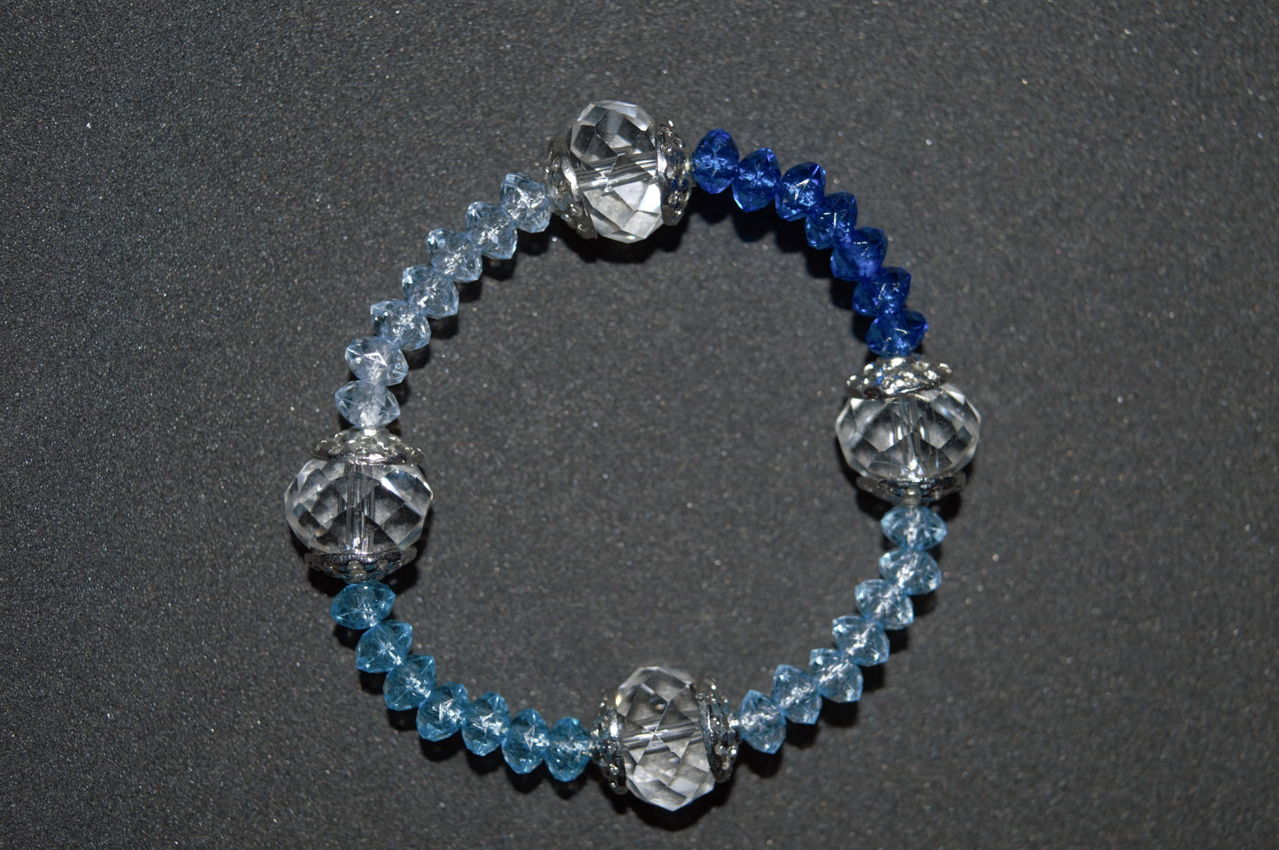 Blue tone and clear faceted bead bracelet