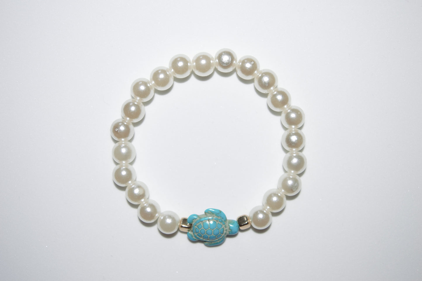 Cream pearl and blue turtle bracelet