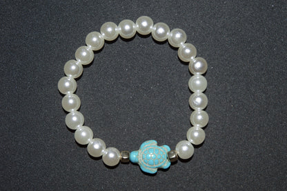 Cream pearl and blue turtle bracelet