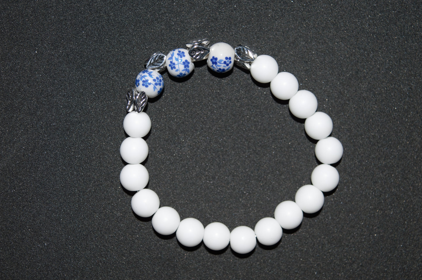 Floral ceramic and white stone bead bracelet